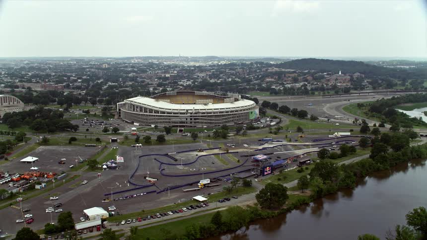 Aerial footage of Robert F Kennedy Memorial Stadium in Washington DC on a cloudy day showcasing the soccer stadium and athletics field