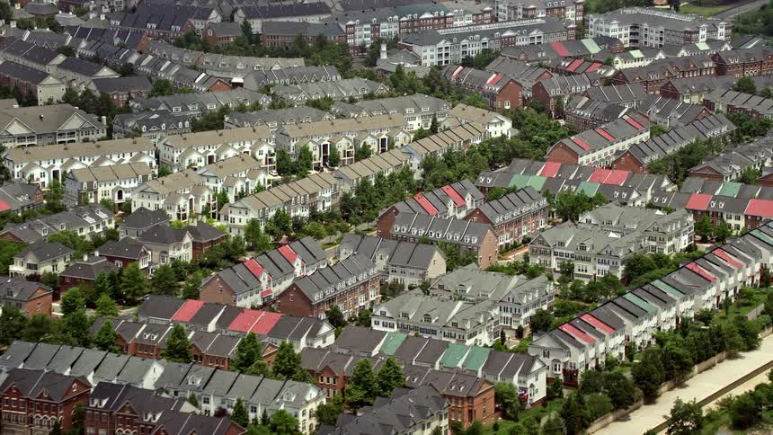 Aerial footage of row houses in Alexandria Virginia during a partly cloudy day