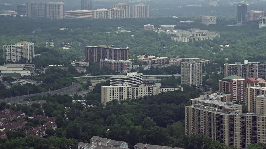 Aerial footage of apartment buildings in Alexandria VA on a hazy day