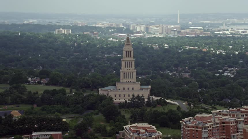Aerial footage of the George Washington Masonic National Memorial a landmark in Alexandria Virginia taken during the daytime