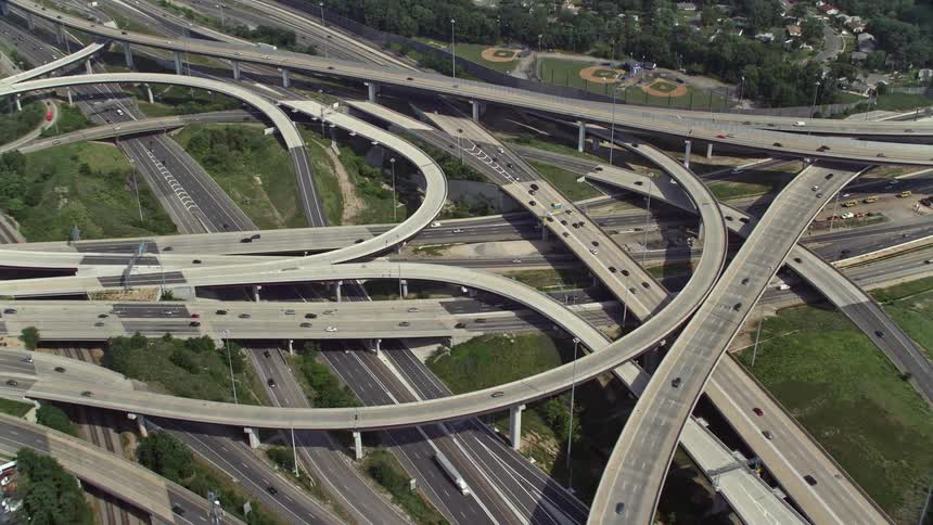 Aerial view of the I-495 and I-395 freeway interchange with light traffic in Springfield Virginia during summer