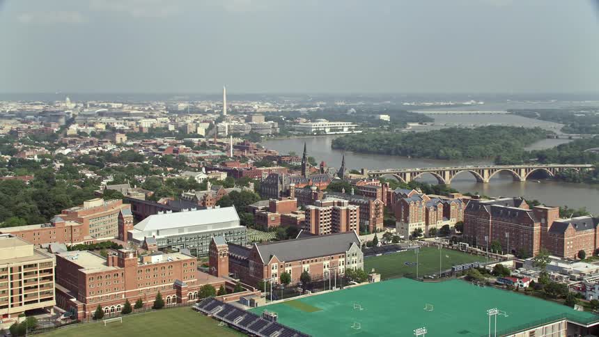 Aerial footage of Georgetown University campus and sports fields in Washington DC during a hazy day