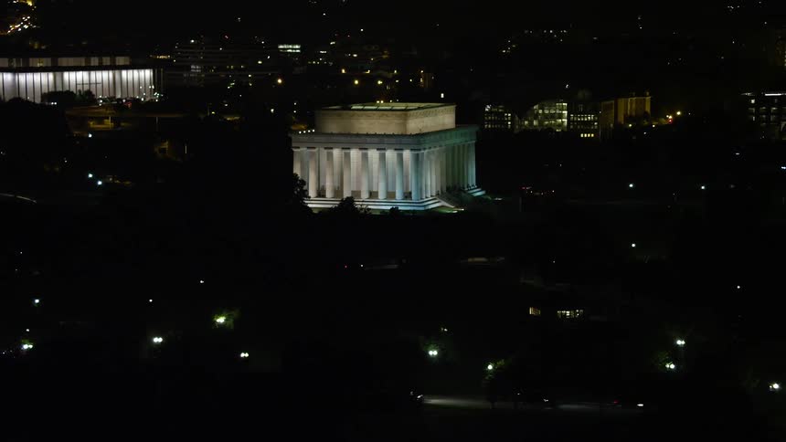 A stunning aerial view of the Lincoln Memorial at night located at the iconic National Mall of Washington DC