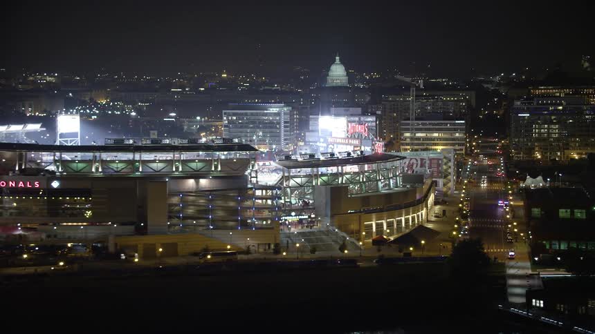 A stunning aerial view of Nationals Park and the United States Capitol in Washington DC at night