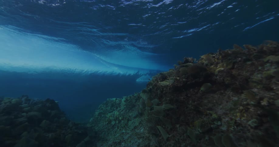 Wave moving under rocks