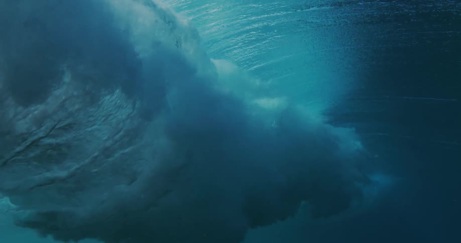 A large wave moves under the surface of the oean