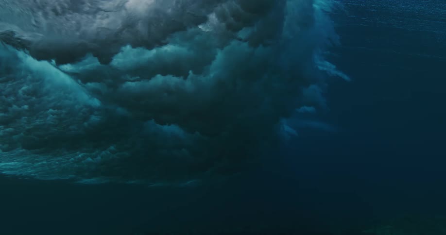 Ocean waves are displayed under the sea