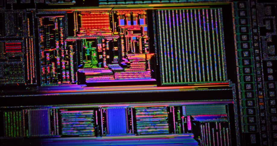 Colorful lights shine on a circuit board