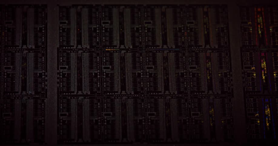 A bright light shines over a circuit board