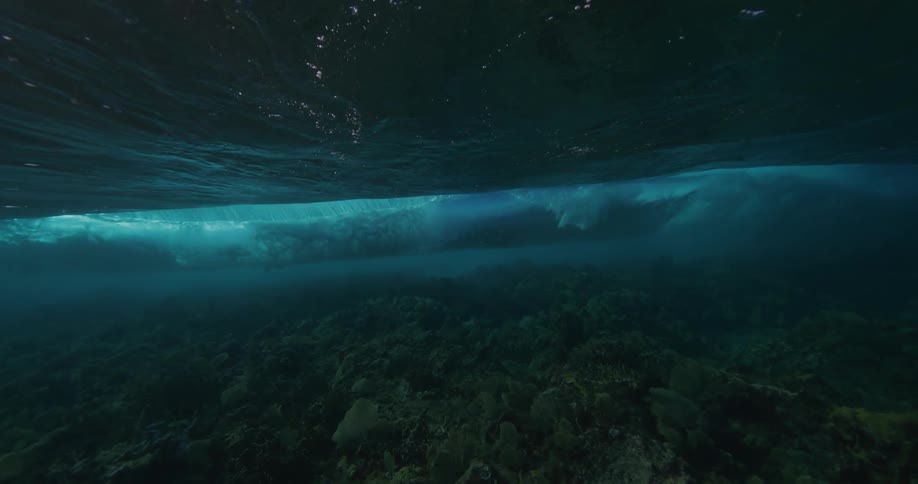 Waves crash into the ocean