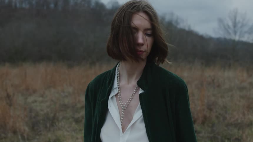 A woman walking toward the camera