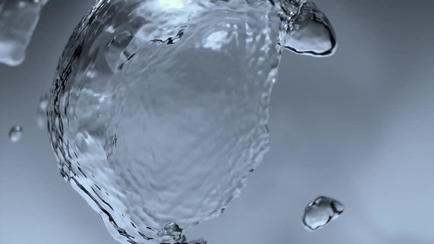 A huge air bubble is rising from the deep to the surface of the water