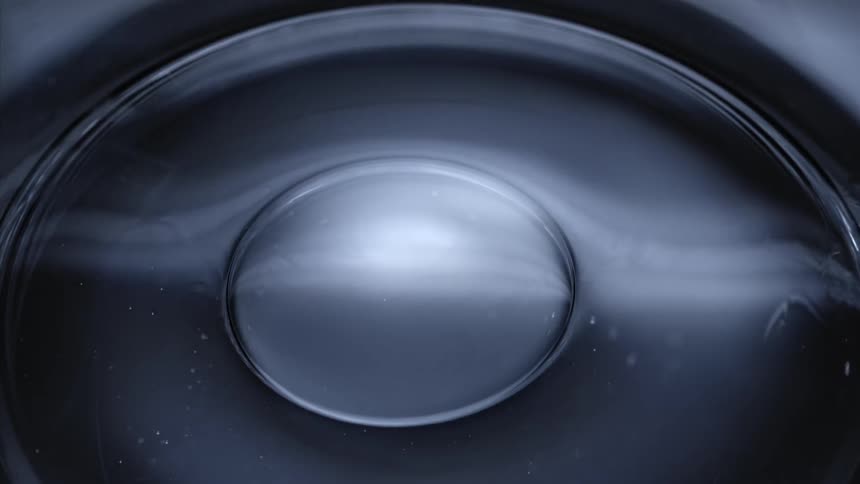 A shiny bubble popping underwater