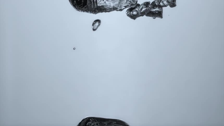 Bubbles in the water are rising to the surface