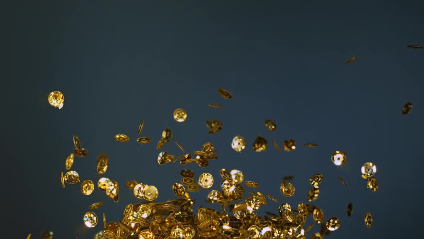 Casino chip golds are being thrown into air