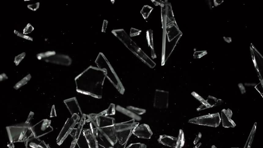 Ice crystal like glass shards flying and rotating in the air