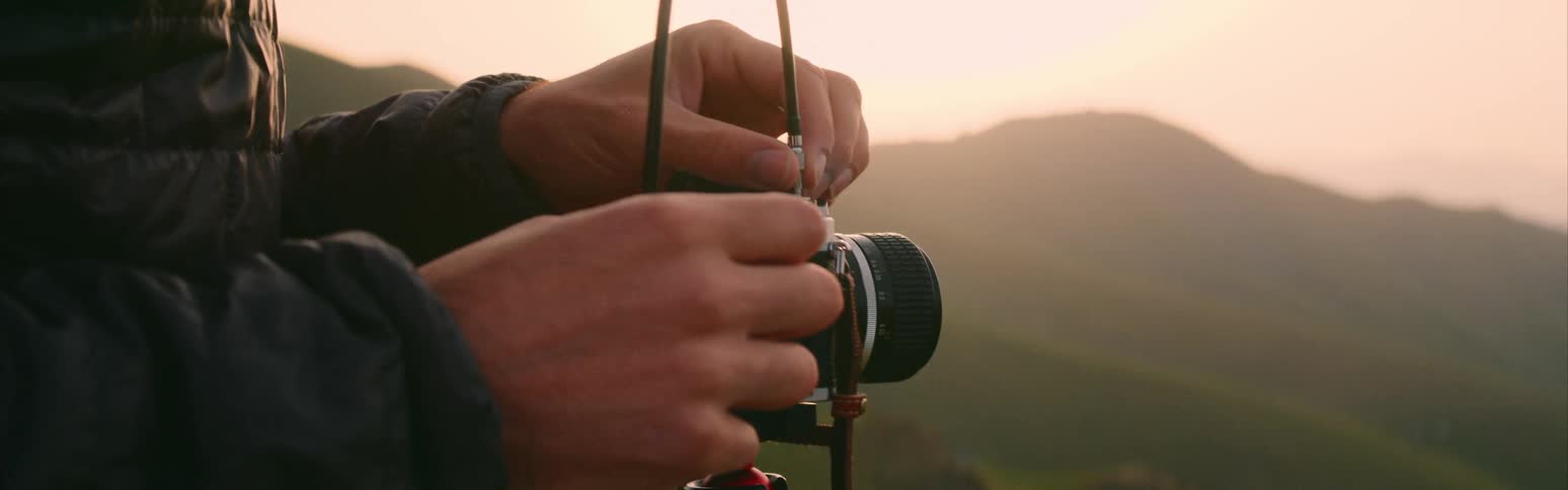 A photographer sets up their camera