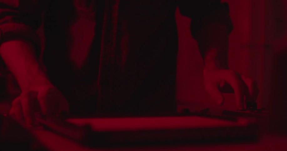 Man scans something on his processing equipment