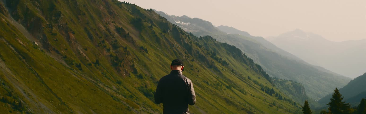 Man looking out over a range