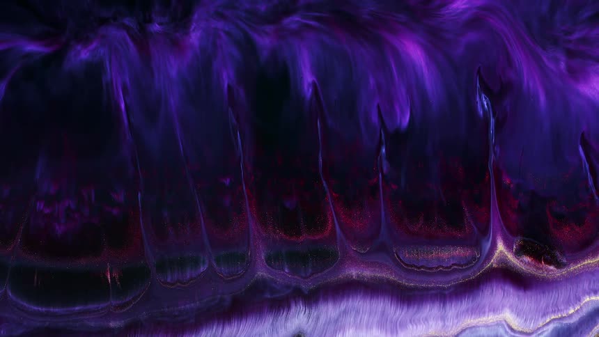 A viscous purple liquid running down a surface
