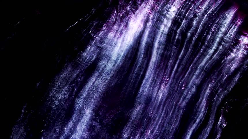 An abstract footage of a purple liquid flow