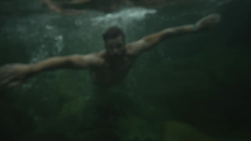 Man swimming underwater
