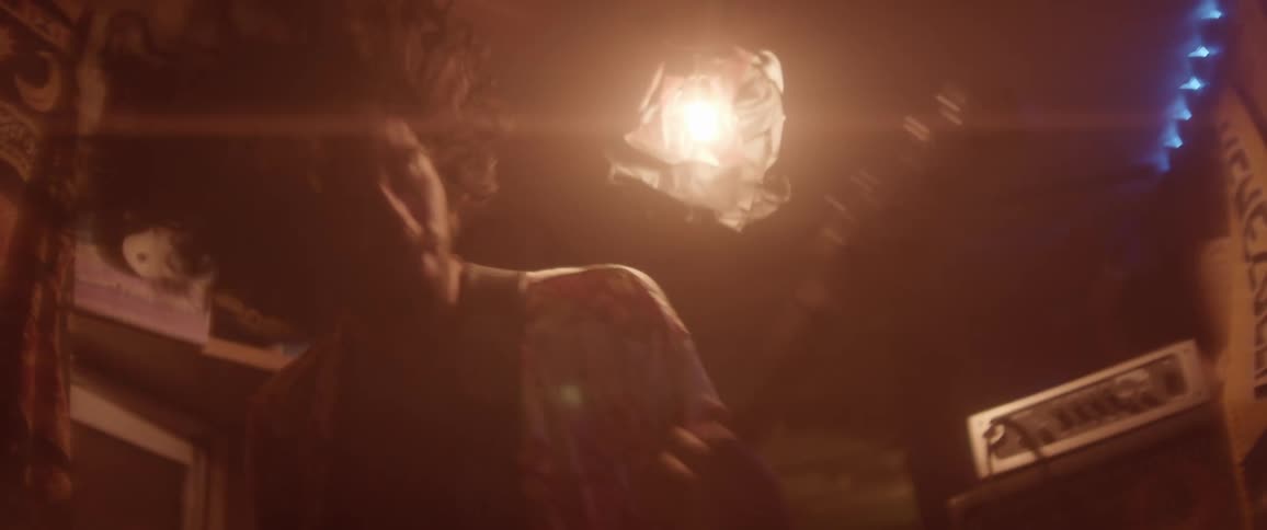 A man is playing the guitar