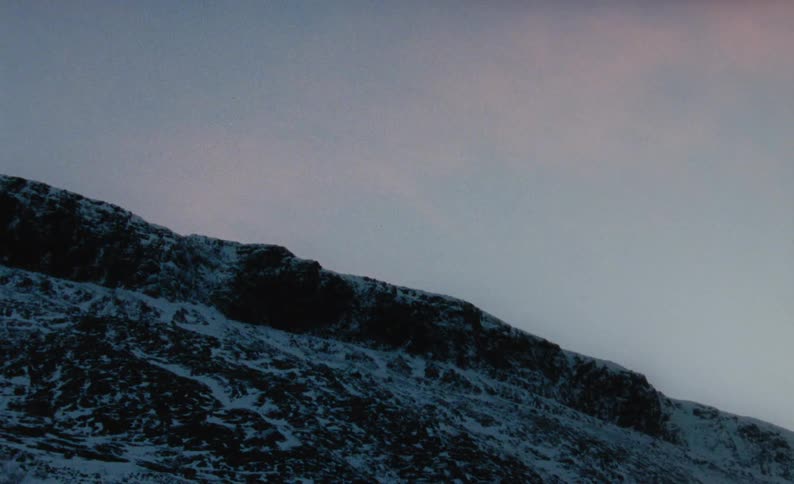 The mountain has snow on it