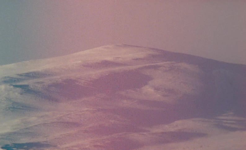 Shot of a mountain on an old camera