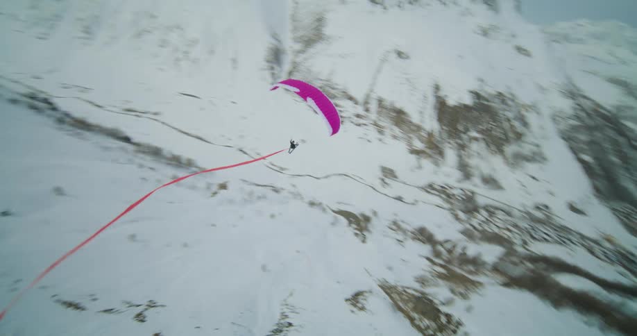 Two paragliders gliding