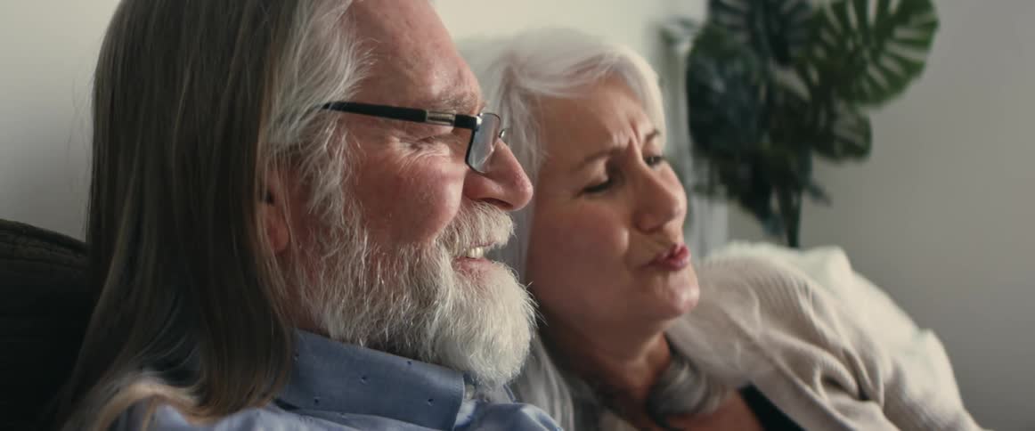 Man and woman looking at something off camera