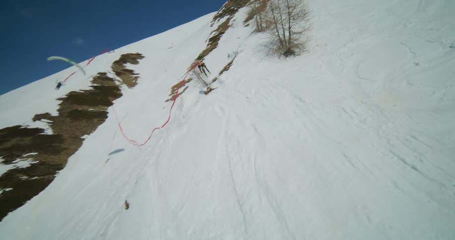 A view of a person skiing down a mountain