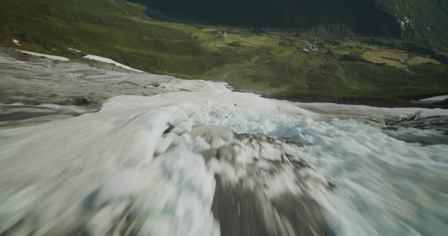Aerial view of a mountainous landscape is displayed