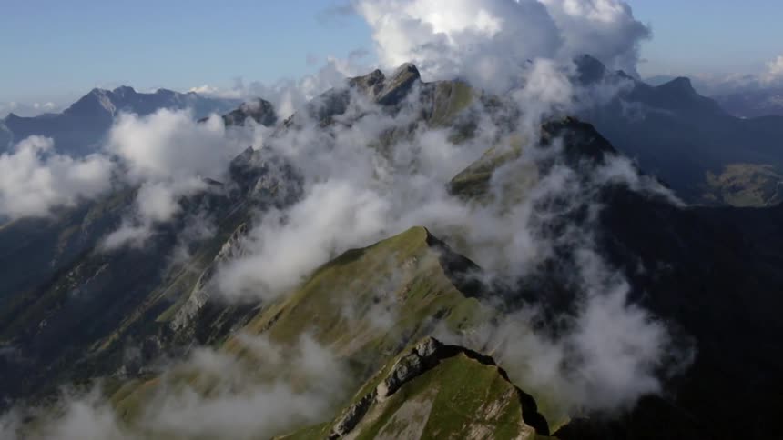 Clouds clinging to mountain peaks