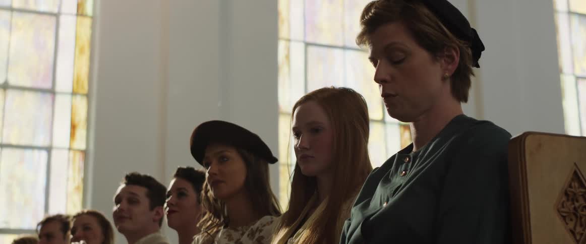 A group of people are sitting in church