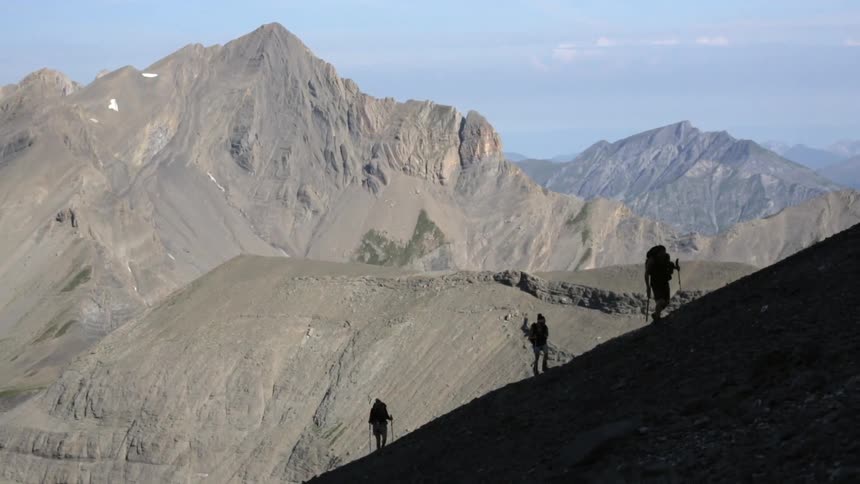 Mountain climbers ascending a slope