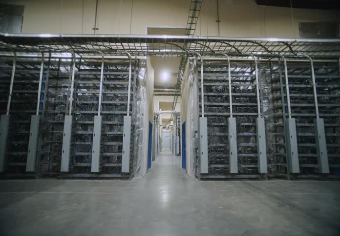 Walking through hallways of a server farm