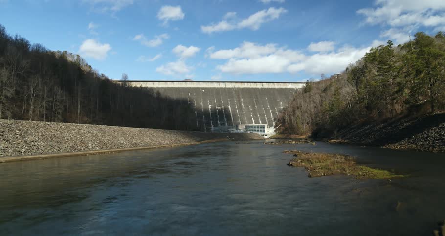 River flowing out of hydroelectric dam