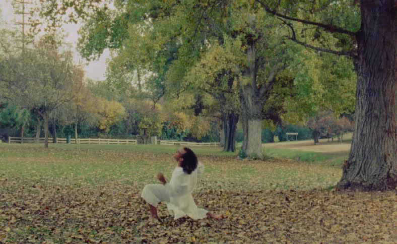 Man doing yoga in a park