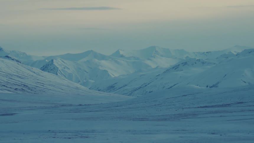 Landscape of snowy mountain range
