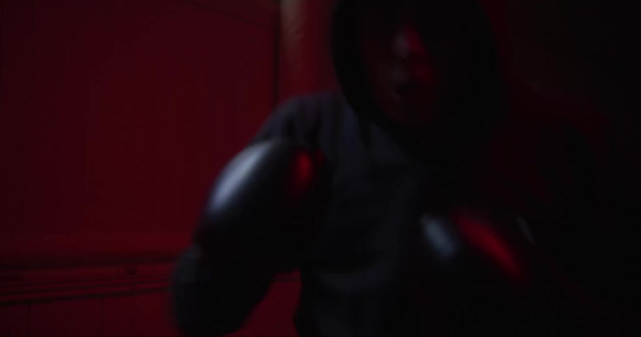 Man boxing a camera