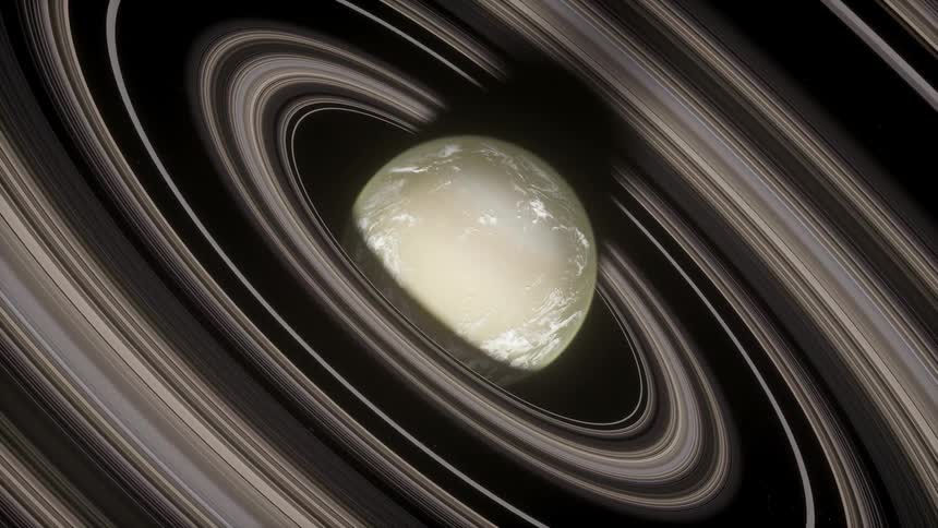 A planet is in the center of massive stripped rings as it floats in space