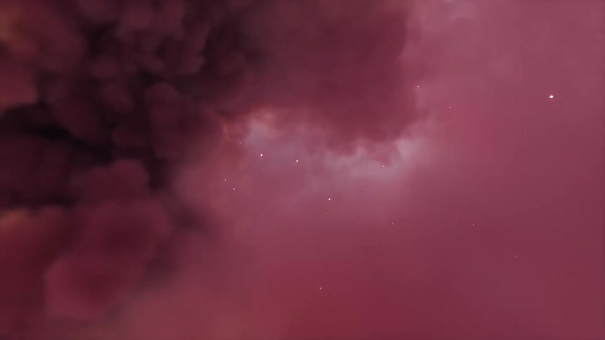 Surreal dreamlike Flyby through a pink nebula in space
