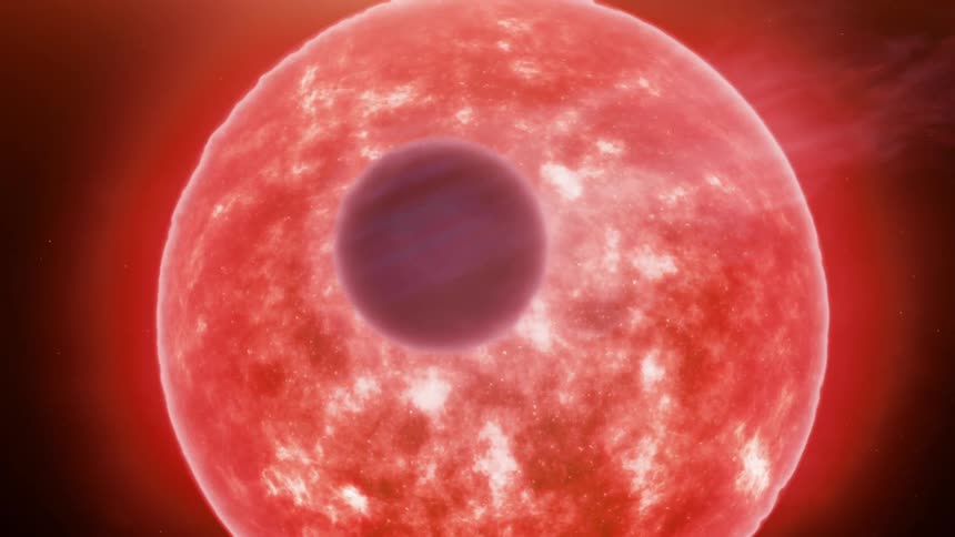 A dark planet moves by a glowing sun as it releases solar flares and flames from the surface into space