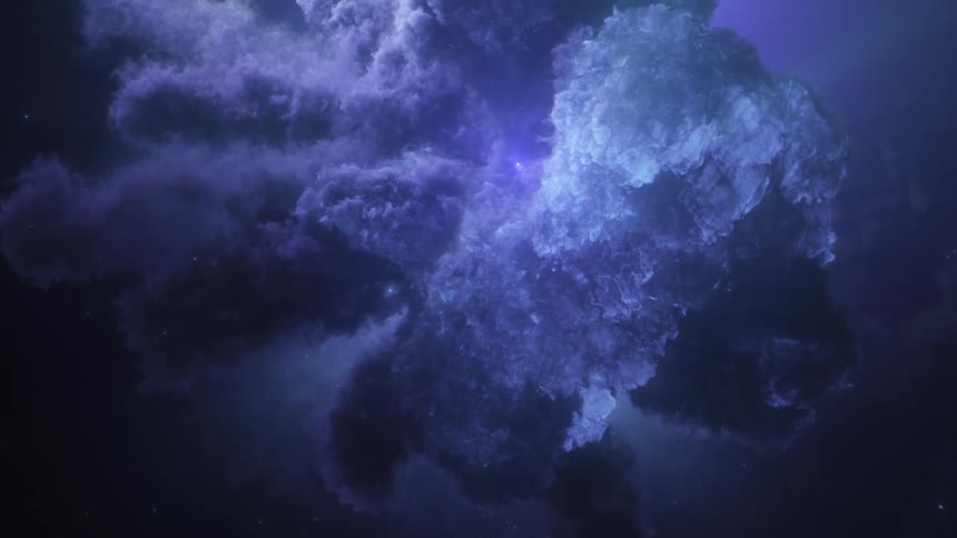 A purple nebula cloud is floating in space