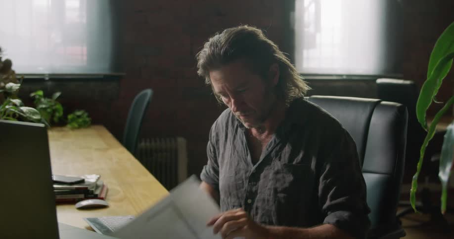 Male architect works hard in the office