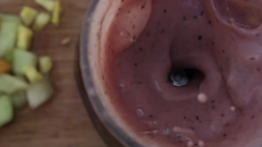 Blender mixing a smoothie