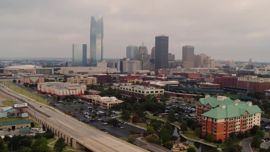 Aerial view of a downtown city is displayed at dusk