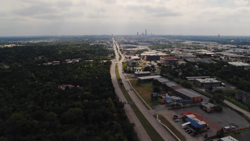 Shot of a freeway next to trees