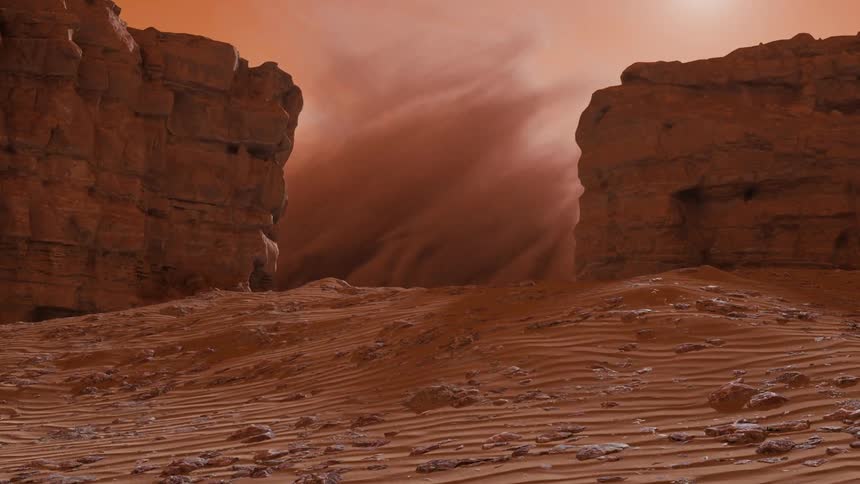 Dust storm rising in a canyon on Mars